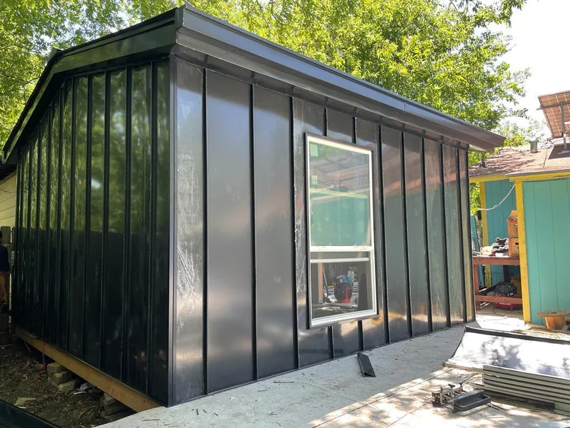 Black standing seam metal wall panels for Metal Roof Installation in Escalon