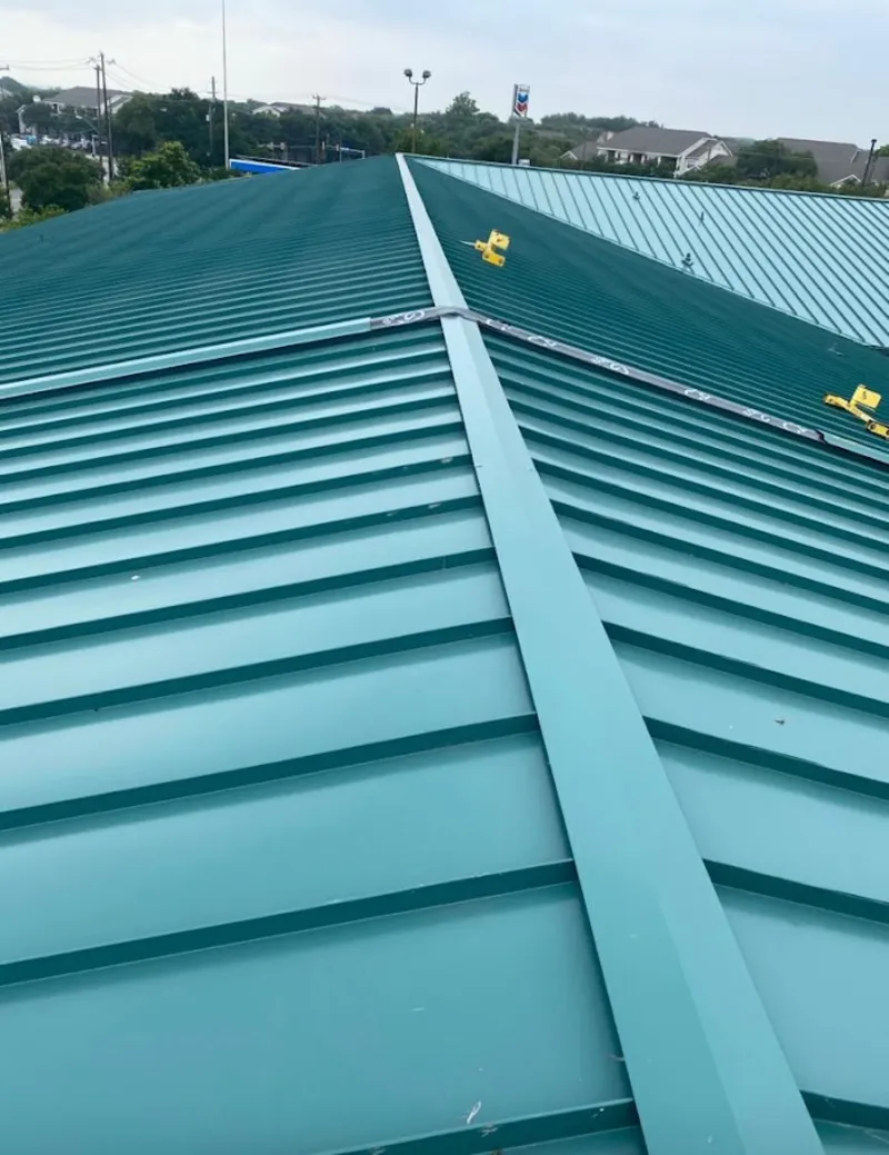Green commercial metal roof ridge and valley for Metal Roof Repair in Escalon
